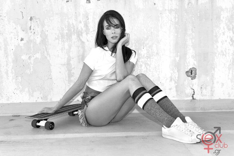 sexy-urban-woman-longboard-sitting-street-black-white-caucasian-young-252918343.jpg