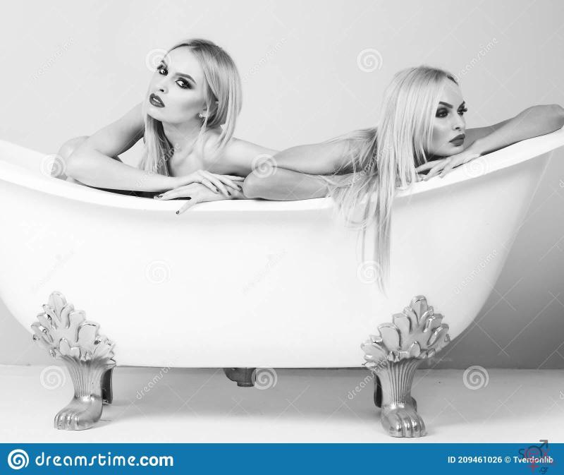 young-women-foreplay-lying-tub-intimacy-lovers-sexy-black-white-woman-209461026.jpg