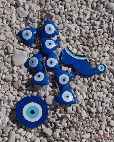 evil-eyes-blye-on-the-beach.jpg